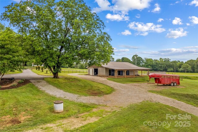 296 Hicks Creek Rd, Troutman, NC 28166 - view of front of property featuring dirt driveway and an outdoor structure