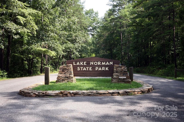 296 Hicks Creek Rd, Troutman, NC 28166 - community / neighborhood sign with a wooded view