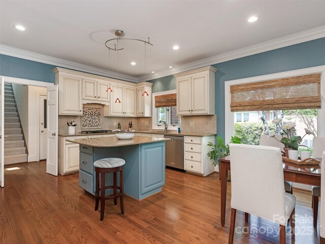 4026 Sharon View Rd, Charlotte, NC 28226 - kitchen with stainless steel dishwasher, a sink, a center island, backsplash, and dark wood-type flooring