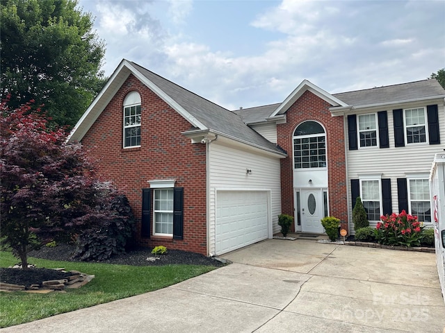 13528 Philip Michael Rd, Huntersville, NC 28078 - traditional home with concrete driveway, brick siding, a garage, and roof with shingles