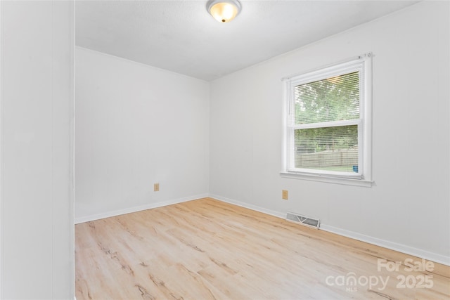 2328 Danforth Ln, Charlotte, NC 28208 - empty room featuring wood finished floors and baseboards