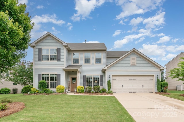 5092 Nighthawk Dr, Indian Land, SC 29707 - view of front facade with driveway, a front lawn, and a garage