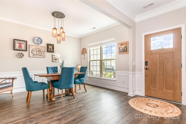 5092 Nighthawk Dr, Indian Land, SC 29707 - dining room featuring plenty of natural light, crown molding, wood finished floors, a wainscoted wall, and a decorative wall