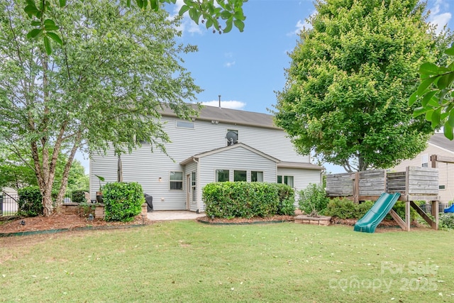 5092 Nighthawk Dr, Indian Land, SC 29707 - back of house featuring a playground