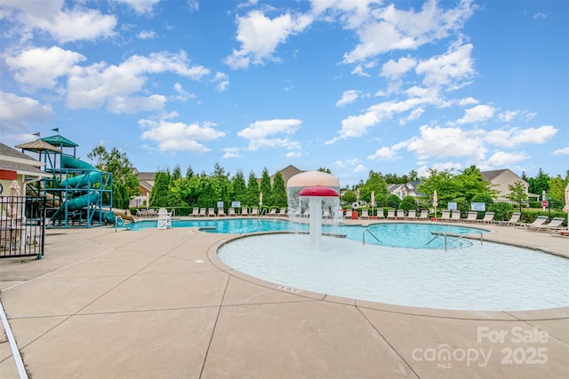 5092 Nighthawk Dr, Indian Land, SC 29707 - community pool featuring a water slide and a patio area