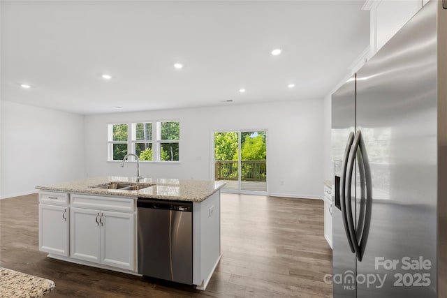 15208 Caspian Way, Charlotte, NC 28278 - kitchen with stainless steel appliances, a sink, healthy amount of natural light, light stone countertops, and recessed lighting