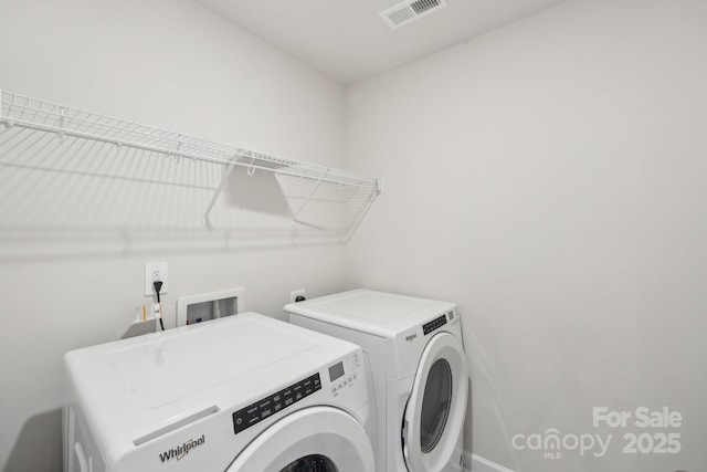1403 Old Rivers Rd, Concord, NC 28027 - washroom featuring independent washer and dryer and baseboards