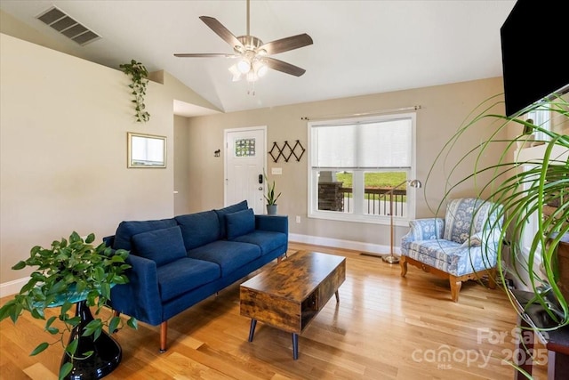 39 Curtis Miles Rd, Alexander, NC 28701 - living area featuring baseboards, light wood finished floors, lofted ceiling, and ceiling fan