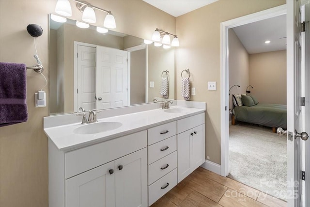 39 Curtis Miles Rd, Alexander, NC 28701 - ensuite bathroom featuring double vanity and baseboards