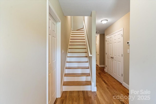 39 Curtis Miles Rd, Alexander, NC 28701 - staircase featuring wood finished floors and baseboards