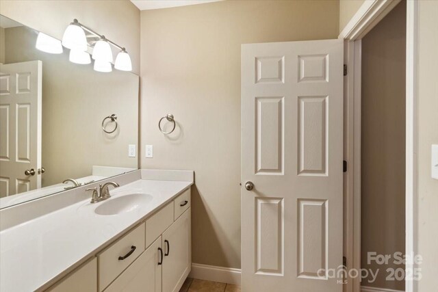 39 Curtis Miles Rd, Alexander, NC 28701 - bathroom featuring vanity, tile patterned floors, and baseboards