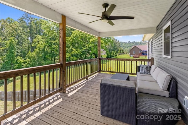 39 Curtis Miles Rd, Alexander, NC 28701 - wooden deck featuring a ceiling fan, a lawn, and outdoor lounge area