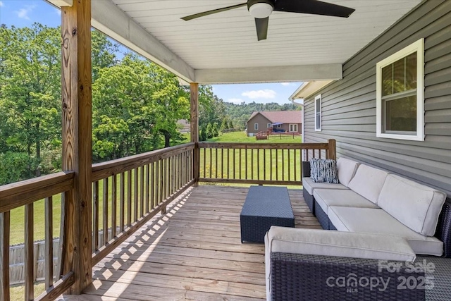 39 Curtis Miles Rd, Alexander, NC 28701 - deck featuring an outdoor living space, a ceiling fan, and a yard