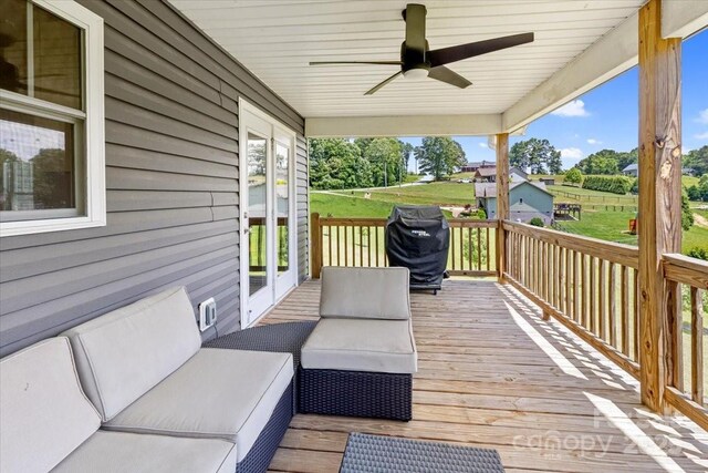 39 Curtis Miles Rd, Alexander, NC 28701 - wooden terrace with a ceiling fan and a grill