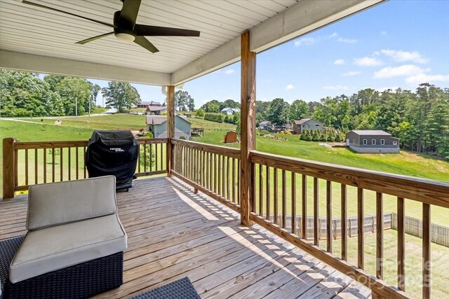 39 Curtis Miles Rd, Alexander, NC 28701 - wooden terrace with a ceiling fan, a yard, and a grill
