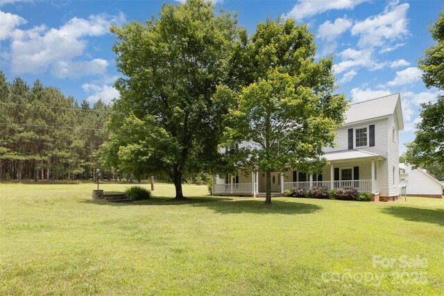 130 Merton Rd, Lawndale, NC 28090 - view of green lawn featuring a porch