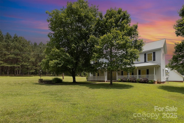 130 Merton Rd, Lawndale, NC 28090 - yard at dusk with a porch and a lawn