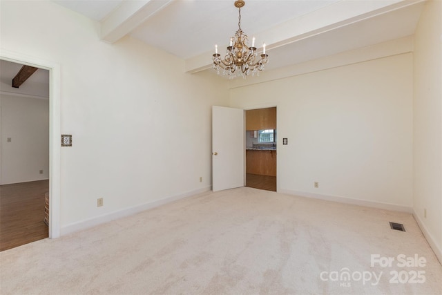 130 Merton Rd, Lawndale, NC 28090 - carpeted empty room featuring beam ceiling, a chandelier, and baseboards