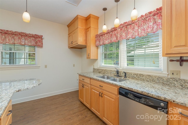 130 Merton Rd, Lawndale, NC 28090 - kitchen with stainless steel dishwasher, a sink, light wood-style flooring, baseboards, and pendant lighting