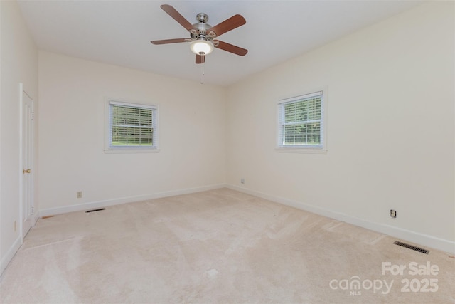 130 Merton Rd, Lawndale, NC 28090 - unfurnished room with baseboards, light colored carpet, and a ceiling fan