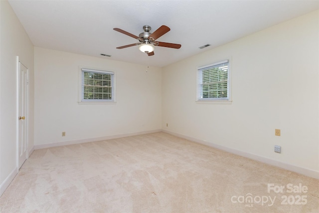 130 Merton Rd, Lawndale, NC 28090 - unfurnished room with light carpet, a ceiling fan, and baseboards