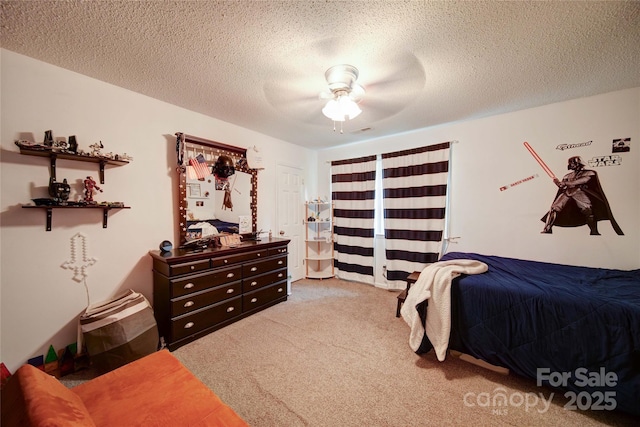 734 Forestbrook Dr, Gastonia, NC 28056 - carpeted bedroom with a textured ceiling and a ceiling fan