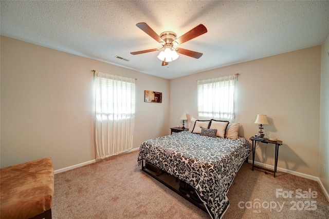 734 Forestbrook Dr, Gastonia, NC 28056 - bedroom featuring carpet floors, ceiling fan, and a textured ceiling