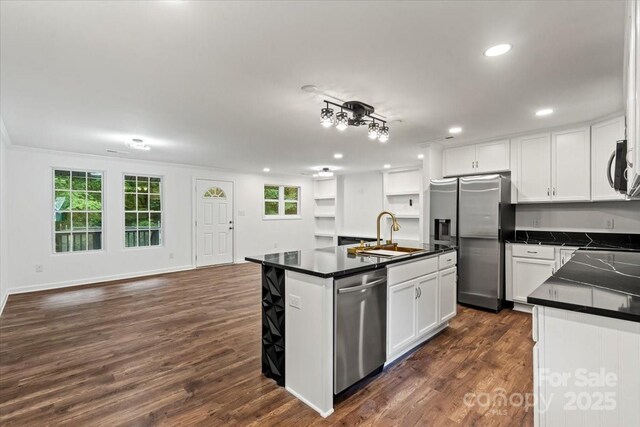 704 W Border St, Dallas, NC 28034 - kitchen with a sink, stainless steel appliances, dark countertops, white cabinets, and recessed lighting