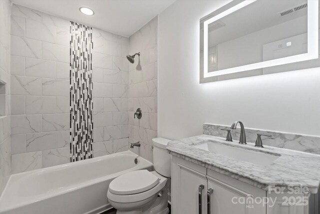 704 W Border St, Dallas, NC 28034 - full bath with vanity, bathing tub / shower combination, toilet, and recessed lighting
