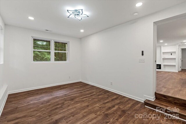 704 W Border St, Dallas, NC 28034 - spare room with dark wood finished floors, baseboards, recessed lighting, and a smoke detector
