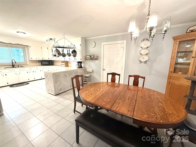3158 Salisbury Hwy, Statesville, NC 28677 - dining area with crown molding, light tile patterned flooring, and a chandelier