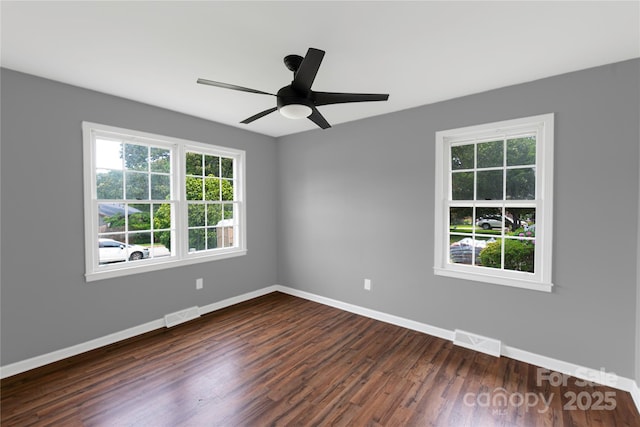 106 Edith Dr, Mauldin, SC 29662 - spare room featuring dark wood finished floors, baseboards, and ceiling fan