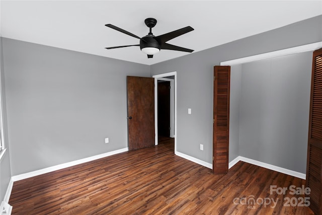 106 Edith Dr, Mauldin, SC 29662 - unfurnished bedroom featuring a closet, wood finished floors, baseboards, and a ceiling fan