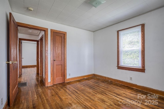 843 Summers Rd, Valdese, NC 28690 - spare room featuring dark wood-style floors and a smoke detector