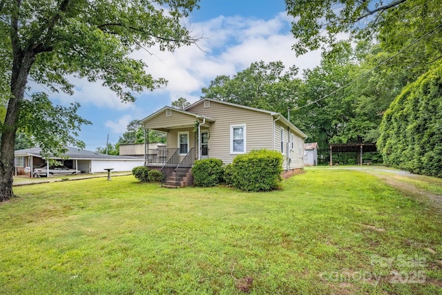 843 Summers Rd, Valdese, NC 28690 - view of front of property featuring covered porch and a front lawn