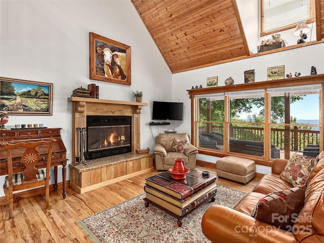 505 Middle Top Loop, Maggie Valley, NC 28751 - living area featuring wood finished floors, a glass covered fireplace, high vaulted ceiling, and wooden ceiling
