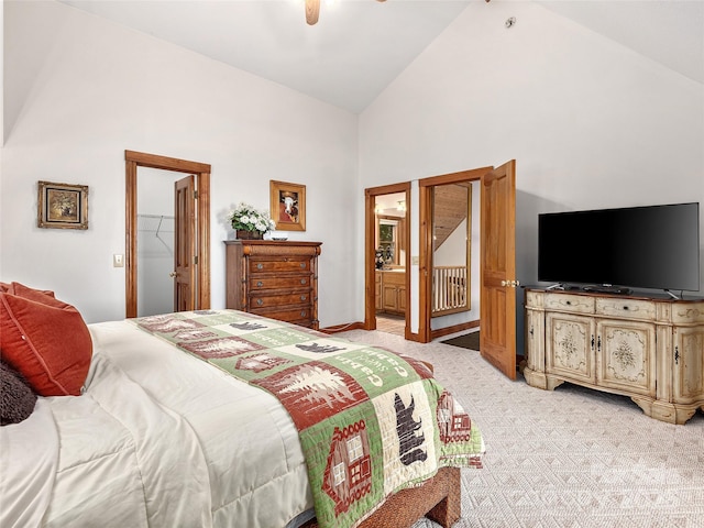 505 Middle Top Loop, Maggie Valley, NC 28751 - bedroom featuring high vaulted ceiling, light carpet, connected bathroom, and a ceiling fan