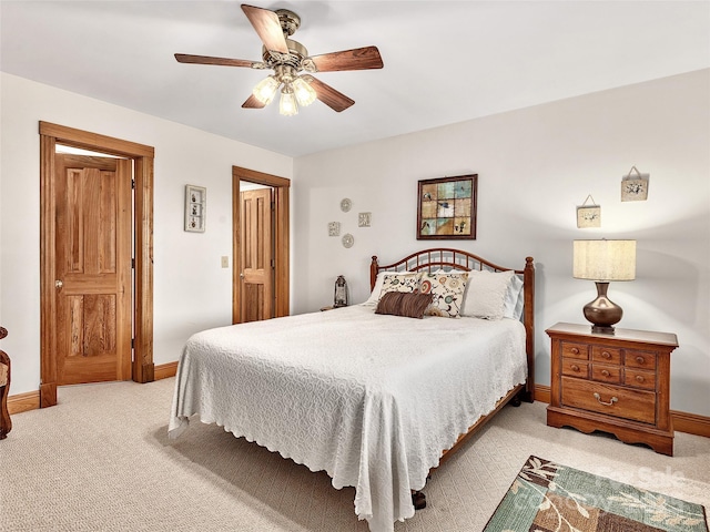 505 Middle Top Loop, Maggie Valley, NC 28751 - bedroom featuring light colored carpet, baseboards, and a ceiling fan