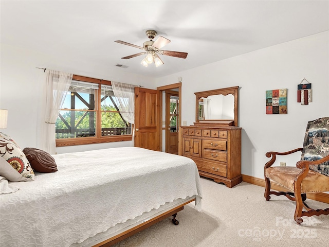 505 Middle Top Loop, Maggie Valley, NC 28751 - bedroom with light carpet, ceiling fan, and baseboards