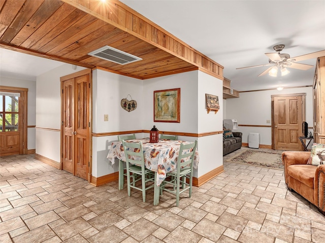 505 Middle Top Loop, Maggie Valley, NC 28751 - dining room with stone finish floors, baseboards, ceiling fan, and wooden ceiling