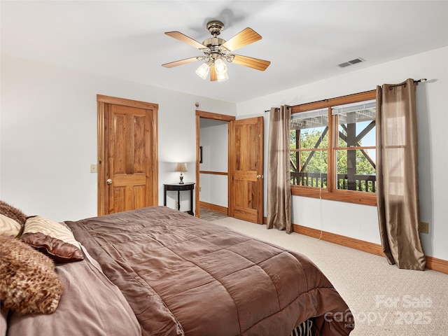 505 Middle Top Loop, Maggie Valley, NC 28751 - carpeted bedroom with baseboards and ceiling fan