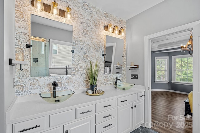 1849 Still Water Ln, Indian Land, SC 29707 - bathroom featuring double vanity, an enclosed shower, ornamental molding, wood finished floors, and baseboards