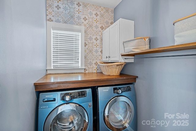1849 Still Water Ln, Indian Land, SC 29707 - washroom featuring washer and clothes dryer, cabinet space, and wallpapered walls