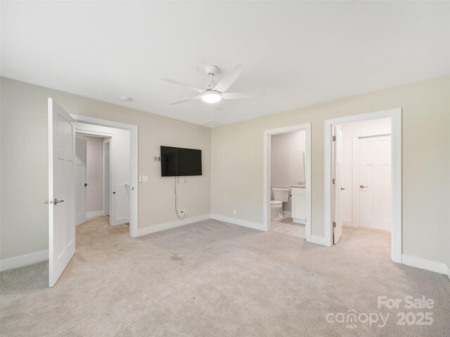 241 Millbrae Loop, Hendersonville, NC 28791 - unfurnished bedroom with light colored carpet, baseboards, ensuite bath, and a ceiling fan