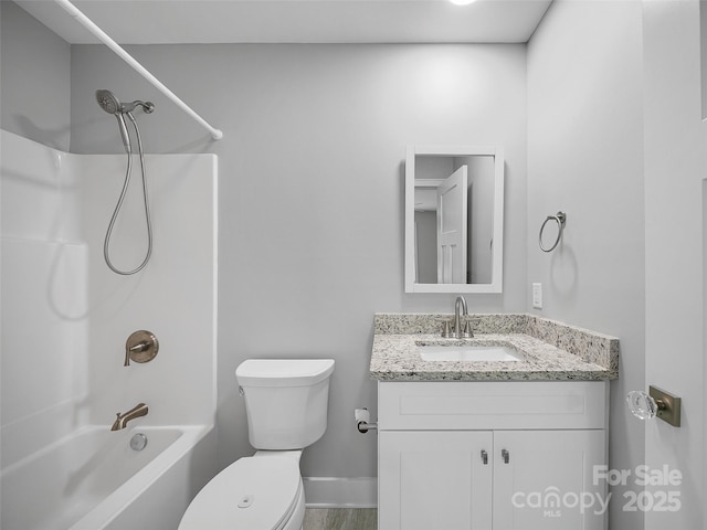 241 Millbrae Loop, Hendersonville, NC 28791 - bathroom with toilet, vanity, bathing tub / shower combination, and baseboards