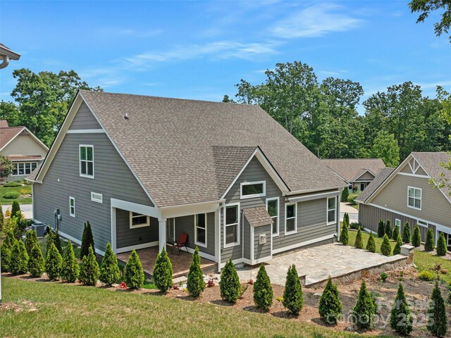 241 Millbrae Loop, Hendersonville, NC 28791 - rear view of house featuring a patio area, a shingled roof, and central air condition unit
