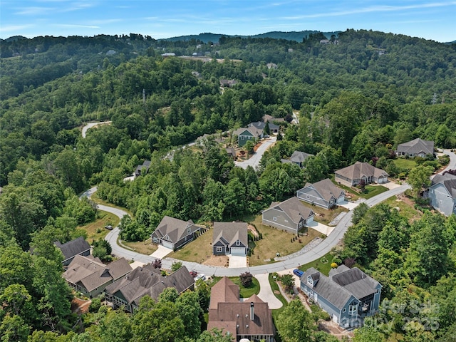 241 Millbrae Loop, Hendersonville, NC 28791 - aerial overview of property's location featuring a heavily wooded area and nearby suburban area