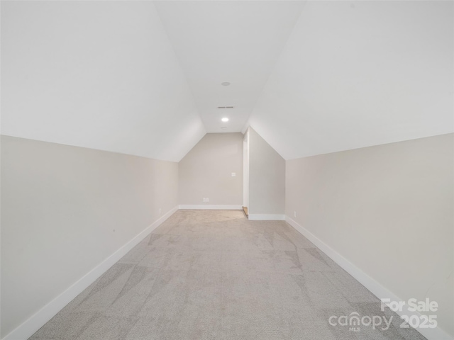 241 Millbrae Loop, Hendersonville, NC 28791 - additional living space featuring lofted ceiling, baseboards, and carpet flooring