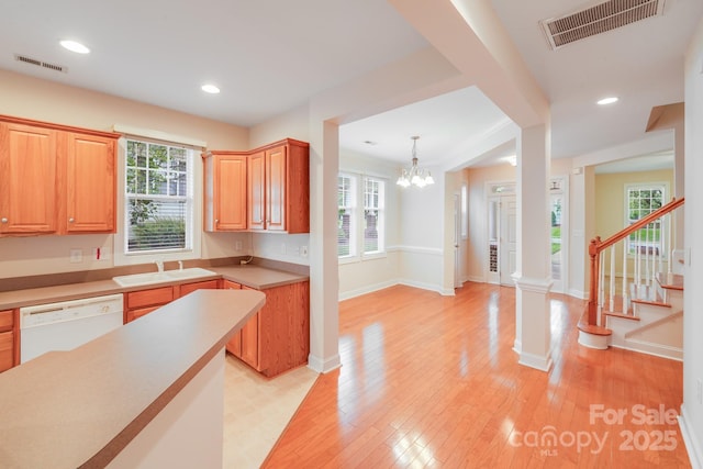 2065 Gable Way Ln, Matthews, NC 28104 - kitchen featuring white dishwasher, plenty of natural light, light wood-type flooring, and recessed lighting