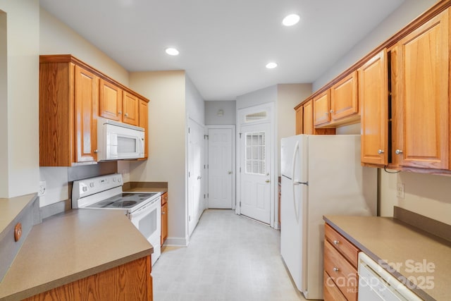2065 Gable Way Ln, Matthews, NC 28104 - kitchen featuring white appliances, light flooring, recessed lighting, and brown cabinets